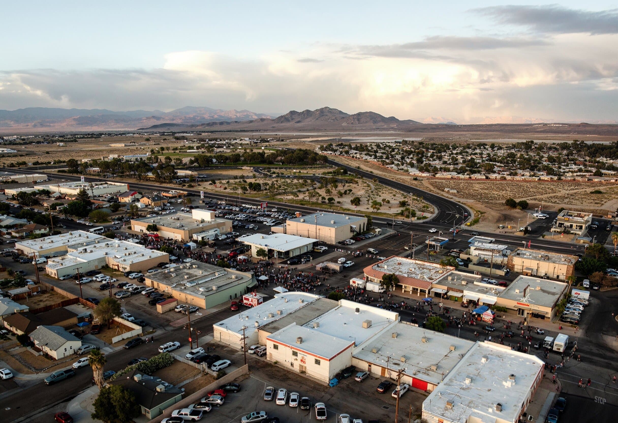 Aerial view of Ridgecrest, California community event with desert mountains in the background